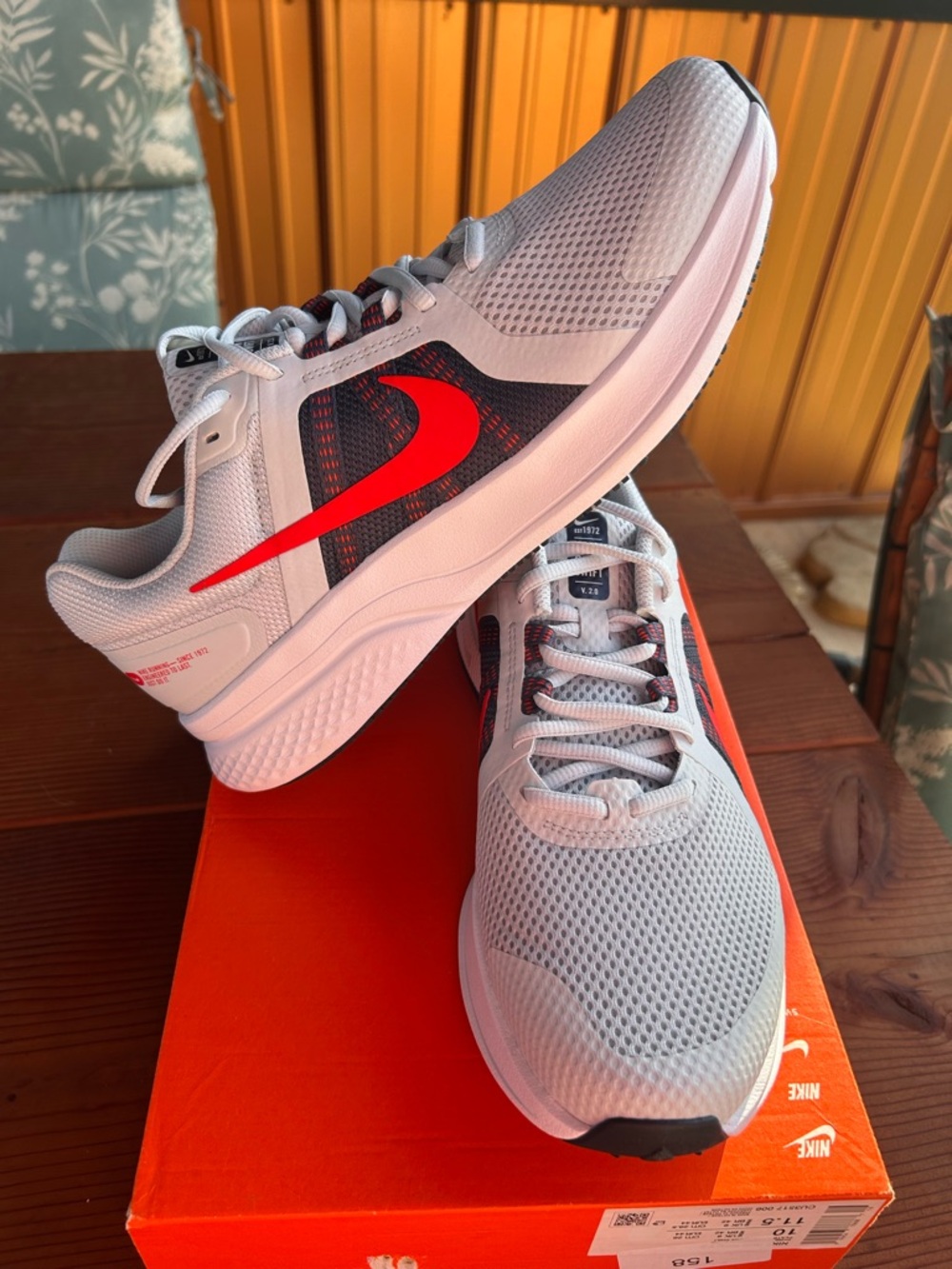 Nike Men’s Athletic Sneakers in White with Red Swoosh